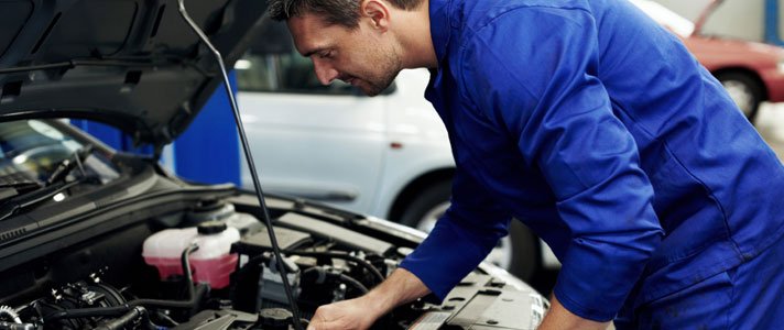 Mechanic Servicing Air Conditioning