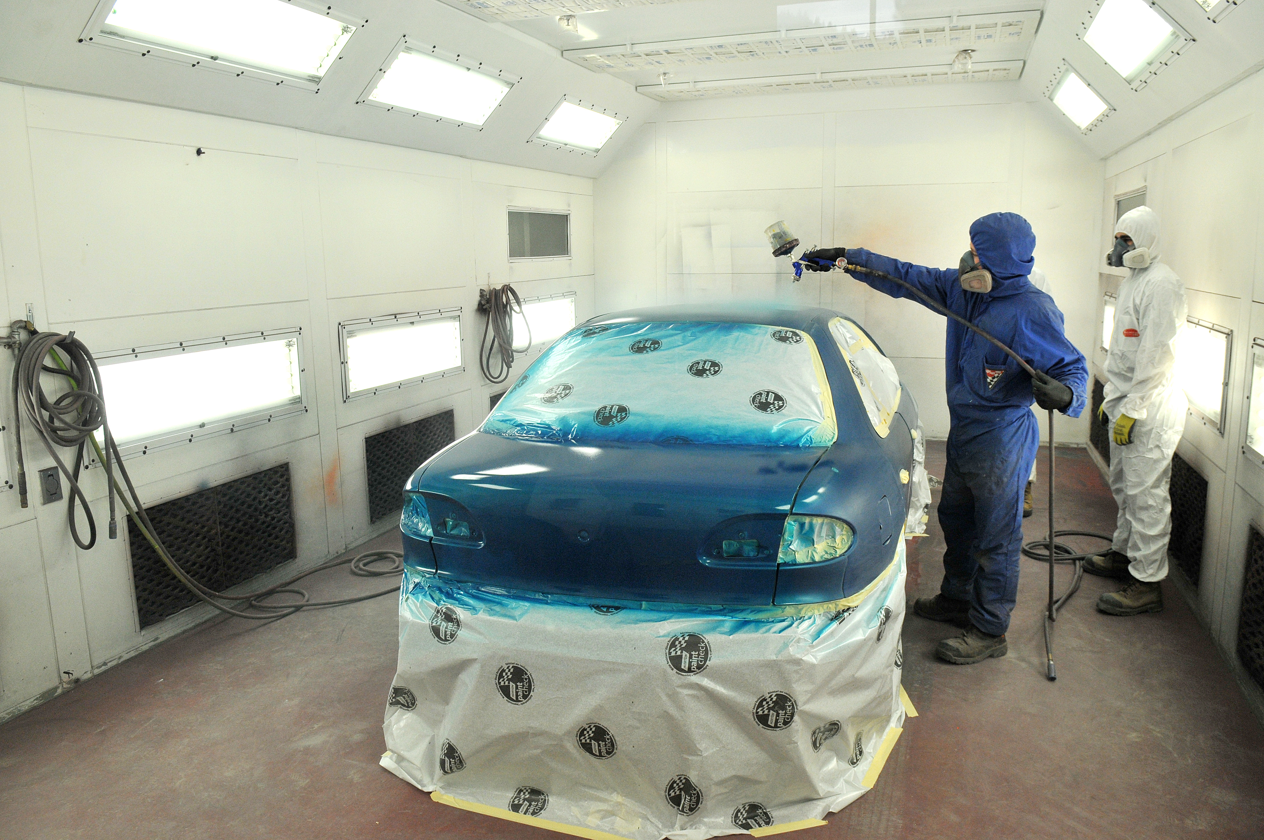 Blue Vehicle Spraying